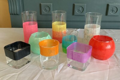 Colored hurricane candle shop holders